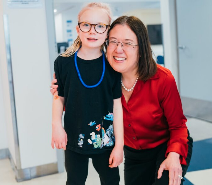 Wendy Chung poses with patient